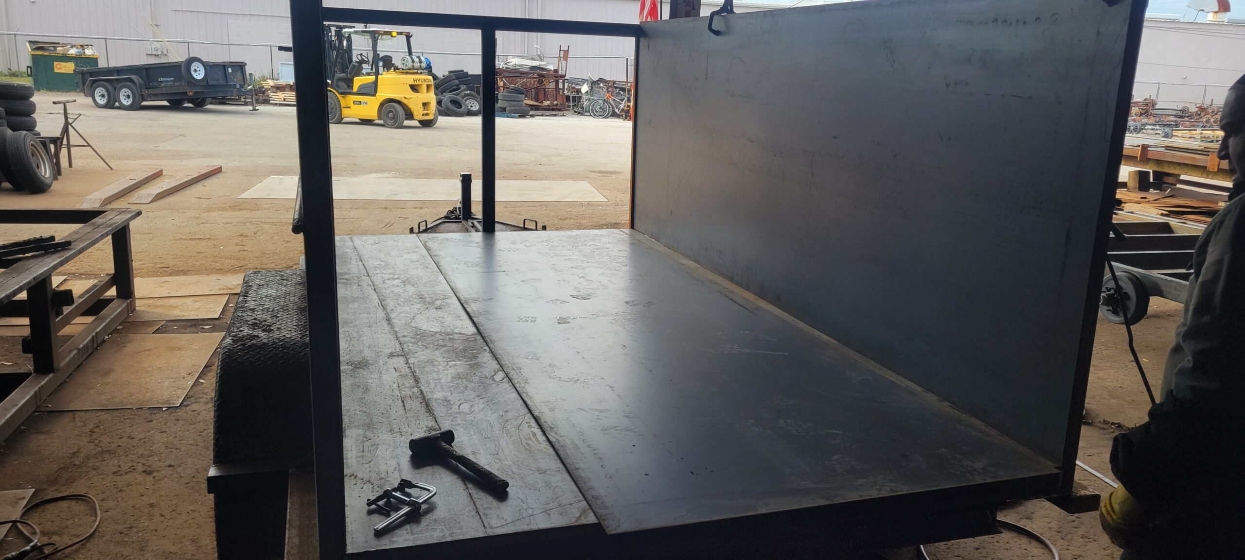 dump trailer bed repair with new steel scaled