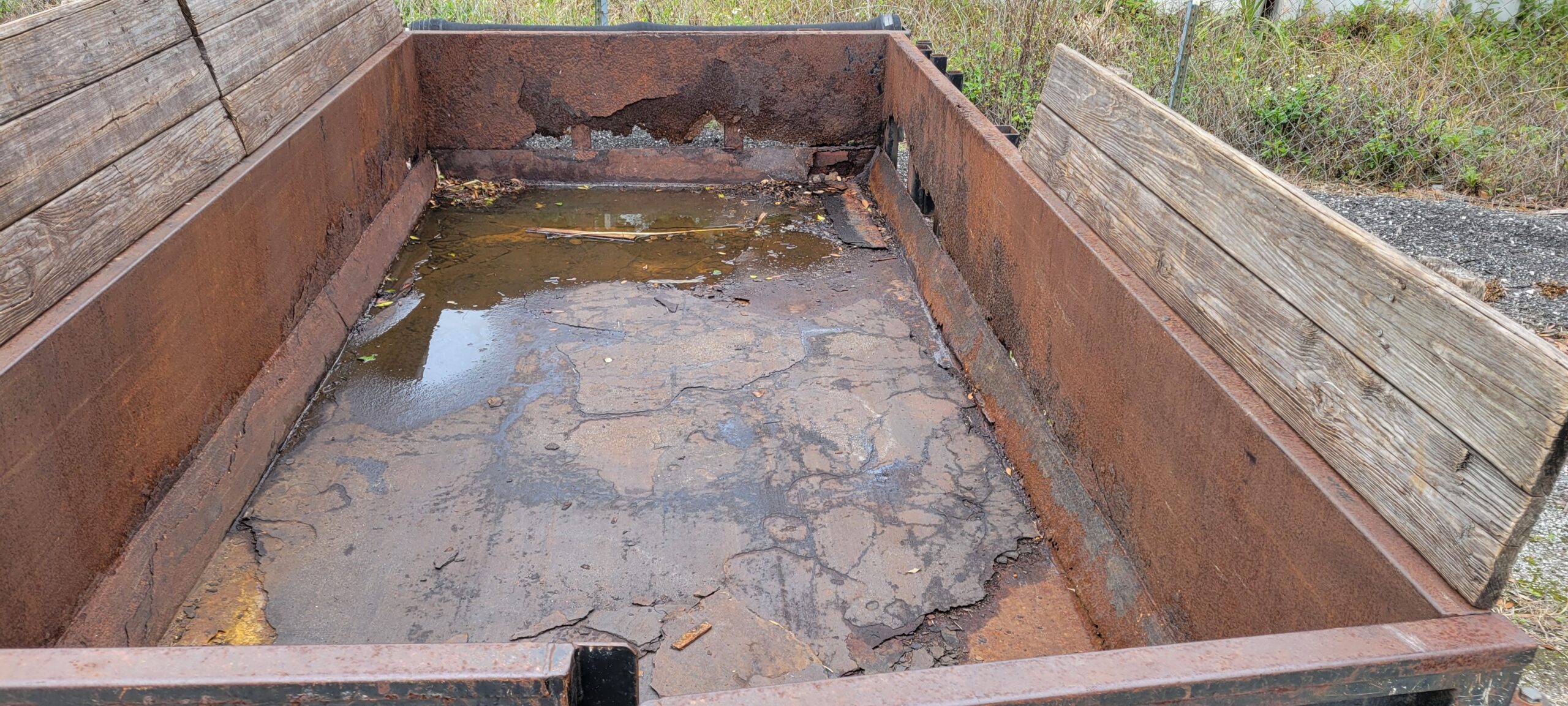 rusted dump trailer bed scaled